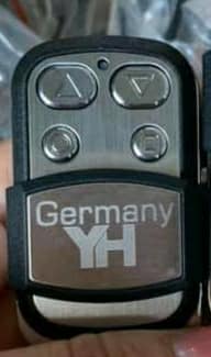Thay pin remote cửa cuốn quận 10