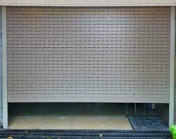Thay pin tay điều khiển cửa cuốn quận 4